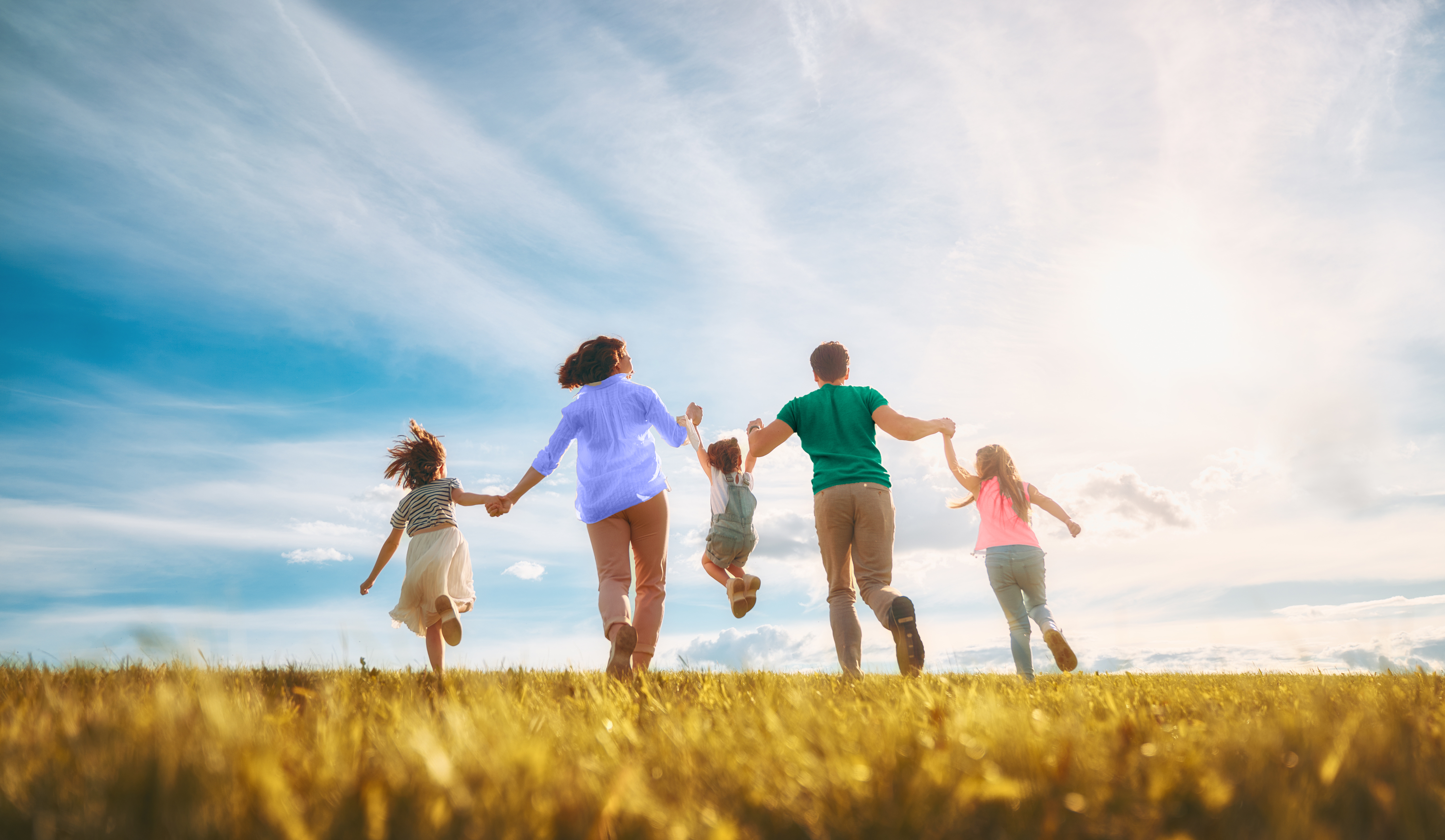 Happy family on summer walk