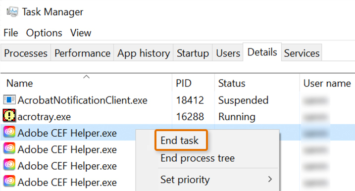 Right click each Adobe process to end it.